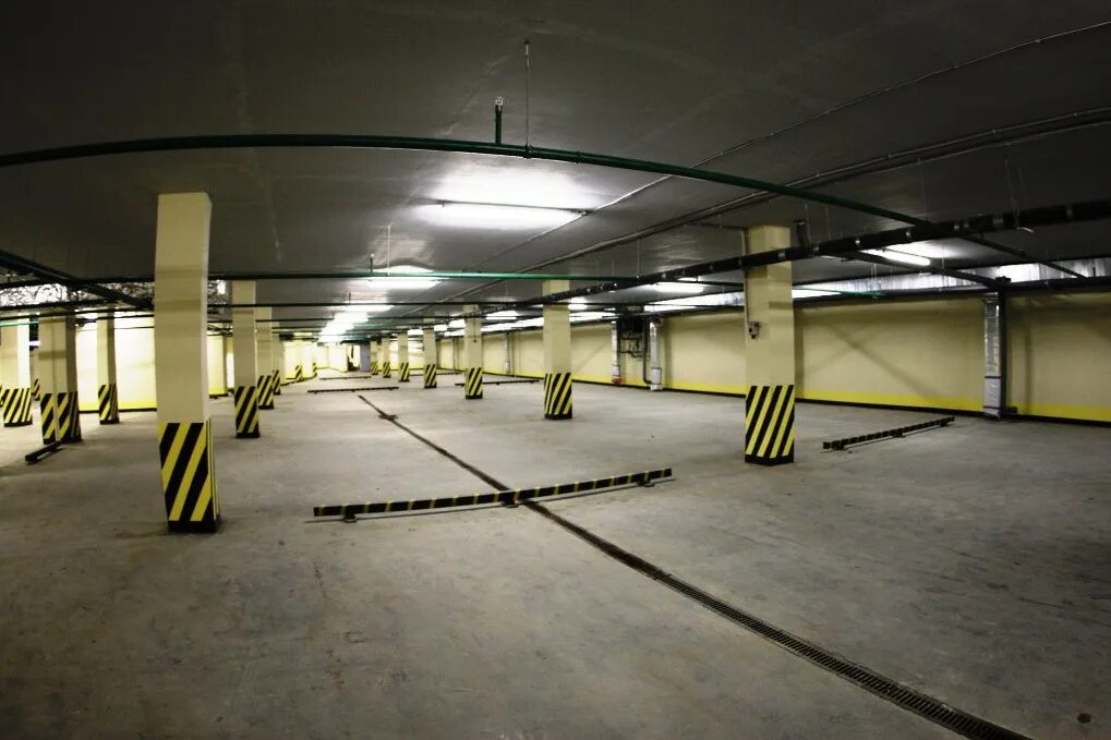 Машиноместо как правильно. Подземная парковка. Подземные автопарковки. Подземная стоянка. Теплый паркинг.