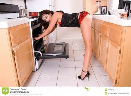 Bent over in kitchen