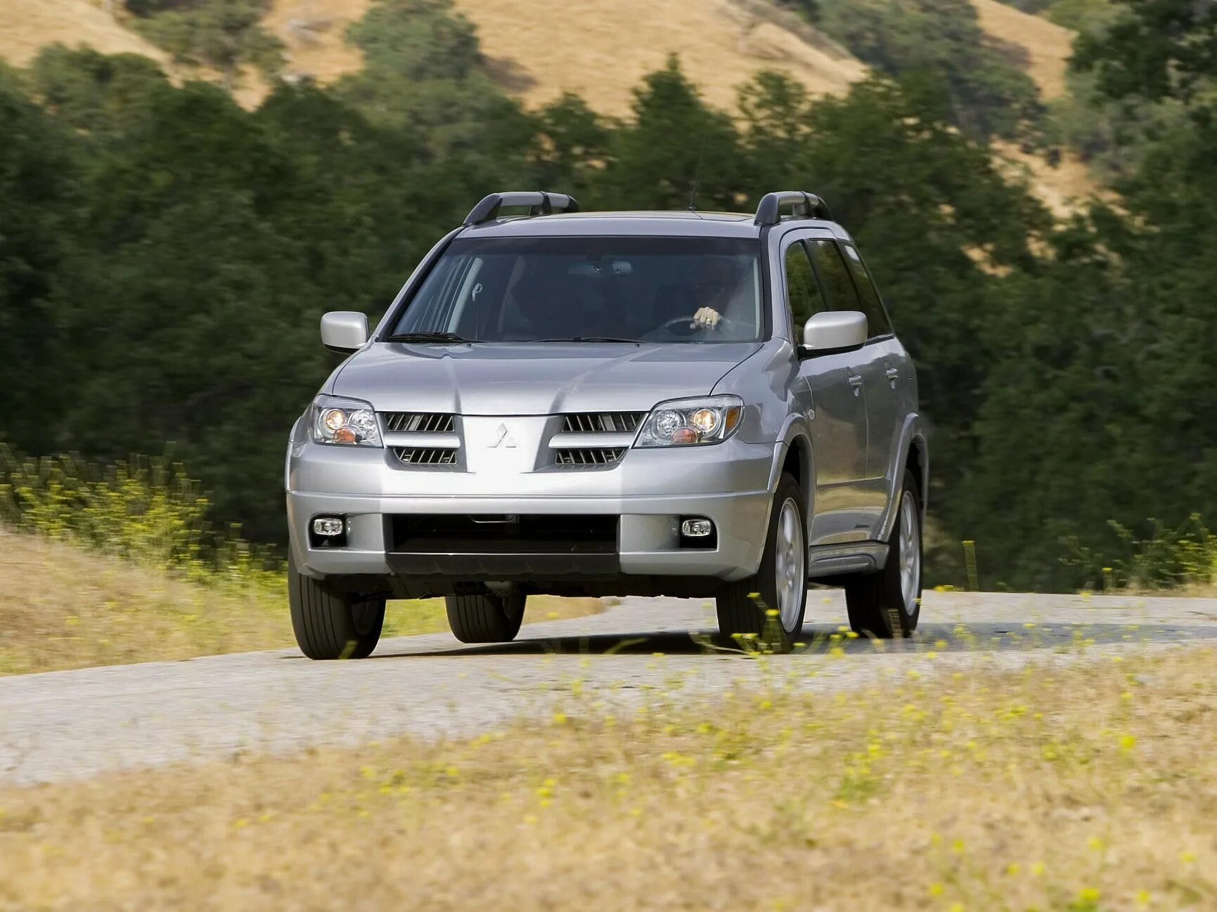 Mitsubishi outlander первое поколение. Мицубиси Аутлендер 1. Аутлендер 1 поколения. Мицубиси Аутлендер 1 поколения. Митсубиси Аутлендер 2003.