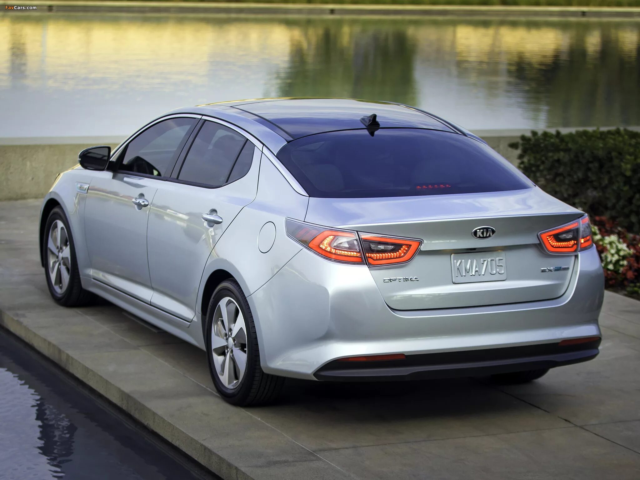 Кия 2013 фото. Kia Optima Hybrid 2014. Kia Optima Hybrid 2013. Киа TF (Оптима) 2014. Kia Optima TF 2013.