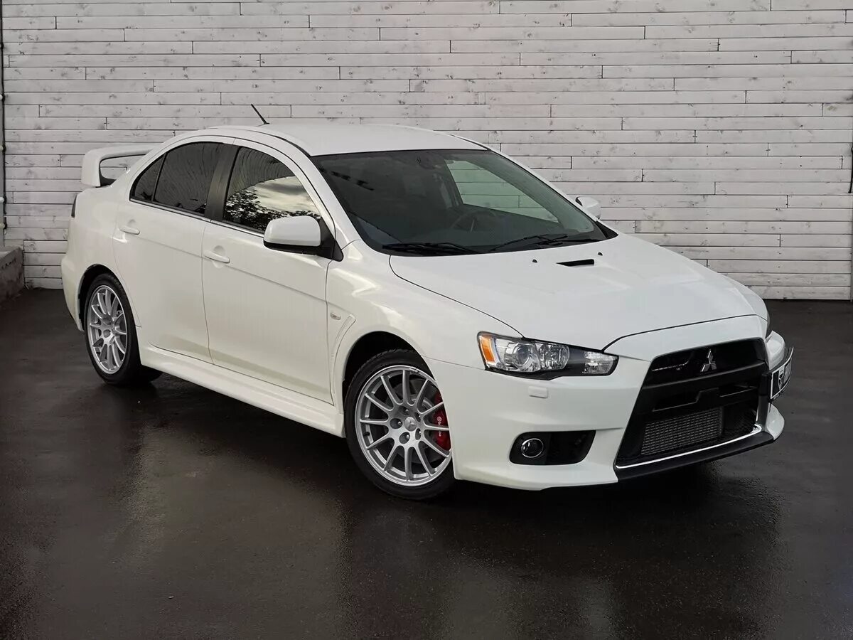 Mitsubishi Lancer Evolution x белый. Mitsubishi Lancer 10 White. Мицубиси Лансер 10 Эволюшн. Mitsubishi Lancer 2014 белый. Лансер 10 купить б у