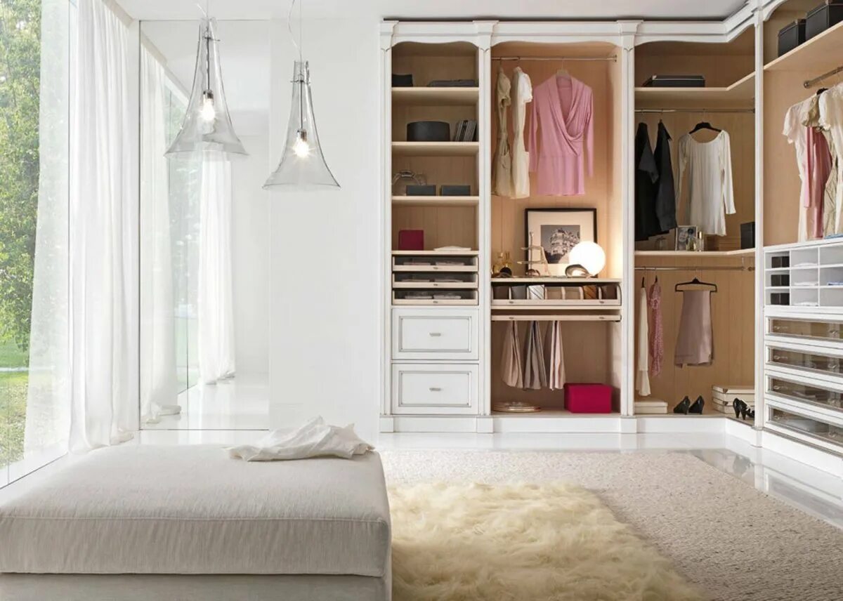 Next to the wardrobe