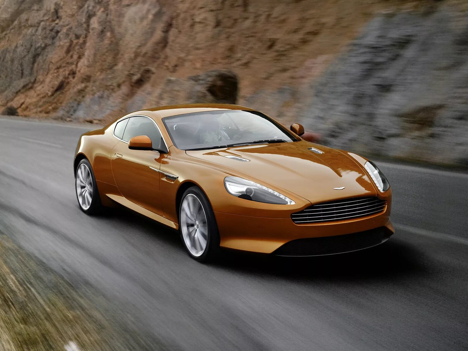 Brown car. Aston Martin Virage 2011. "Aston Martin" "Virage" "2011" ei.