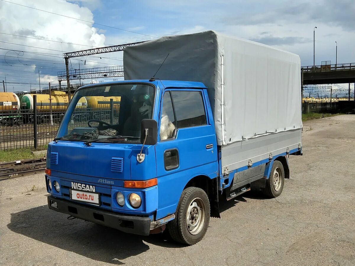 Купить грузовик атлас. Nissan Atlas 1990. Nissan Atlas 100. Nissan Atlas 4wd 1990. Nissan Atlas 1990 дизель.