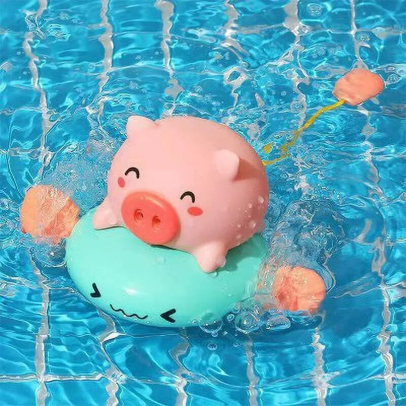 Свинка плавает. Игрушка для ванной поросята. Поросенок в ванне. Игрушка для ванной поросенок который в воде становится чистым.
