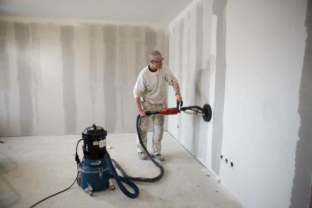 демонтаж бетонной стены. демонтаж шпаклевки. шлифовка стен под обои. шлифовка поверхности стен. штукатурка стен без пыли.