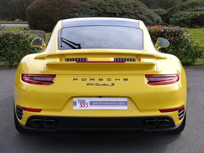 Спойлер порше. Porsche 991 Turbo s. Porsche 911 Turbo 991. Porshe 911 Turbo s 991. Porsche 911 Turbo s желтый.