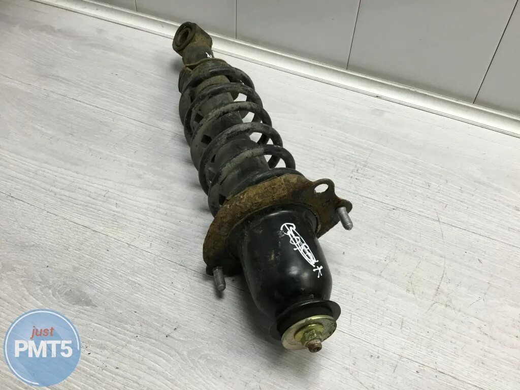 Задние амортизаторы тойота королла 120. 333339. Corolla 120 стойка амортизатора. Амортизатор задний левый toyota corolla e120 размер. Задний амортизатор тойота королла.