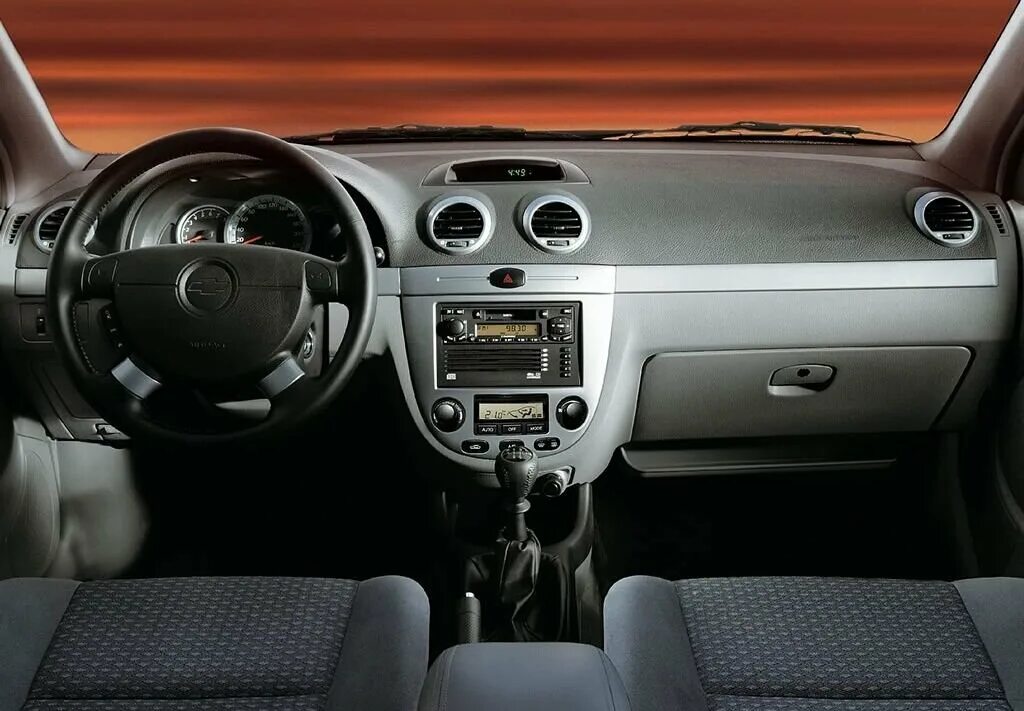 Лачетти универсал салон. Chevrolet Lacetti 2004 салон. Шевроле Лачетти хэтчбек 1.6 салон. Chevrolet Lacetti 2009 салон. Шевроле Лачетти седан 1.6 салон.