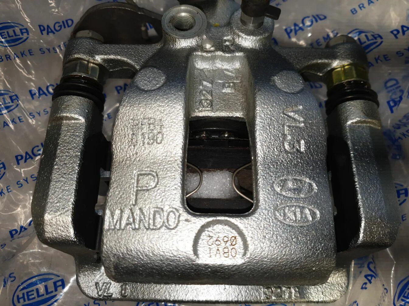 Суппорт тормозной задний киа рио. Суппорт задний левый киа рио 3. Тормозной суппорт рио 3. Суппорт киа рио 3. Суппорт задний рио 3.