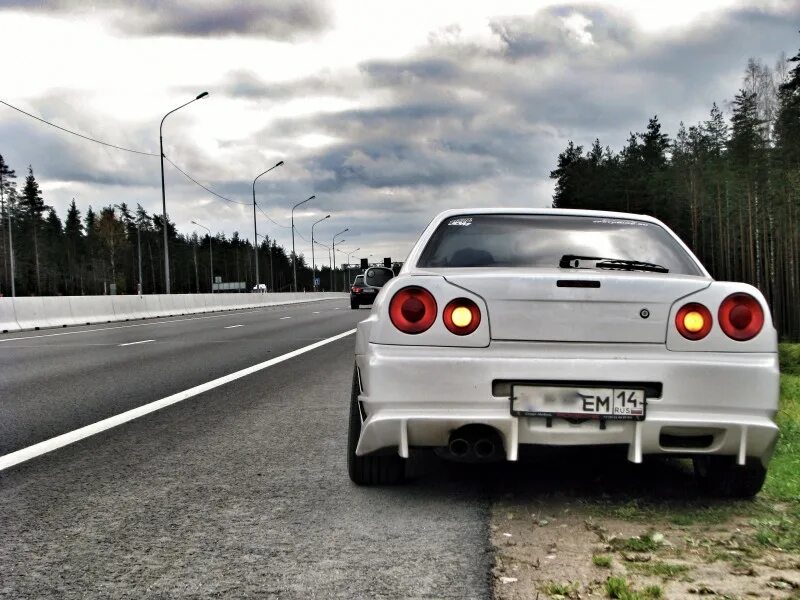 R34 34. Nissan Skyline r34 купе. Nissan Skyline er34. Nissan Skyline r34 белый. Nissan Skyline r34 taillights.