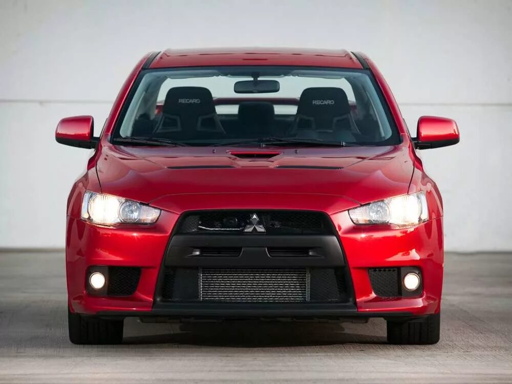 Mitsubishi Lancer Evolution 12. Mitsubishi Lancer Evolution 10. Мицубиси Лансер x10. Митсубиси Лансер Эволюшн 2010.