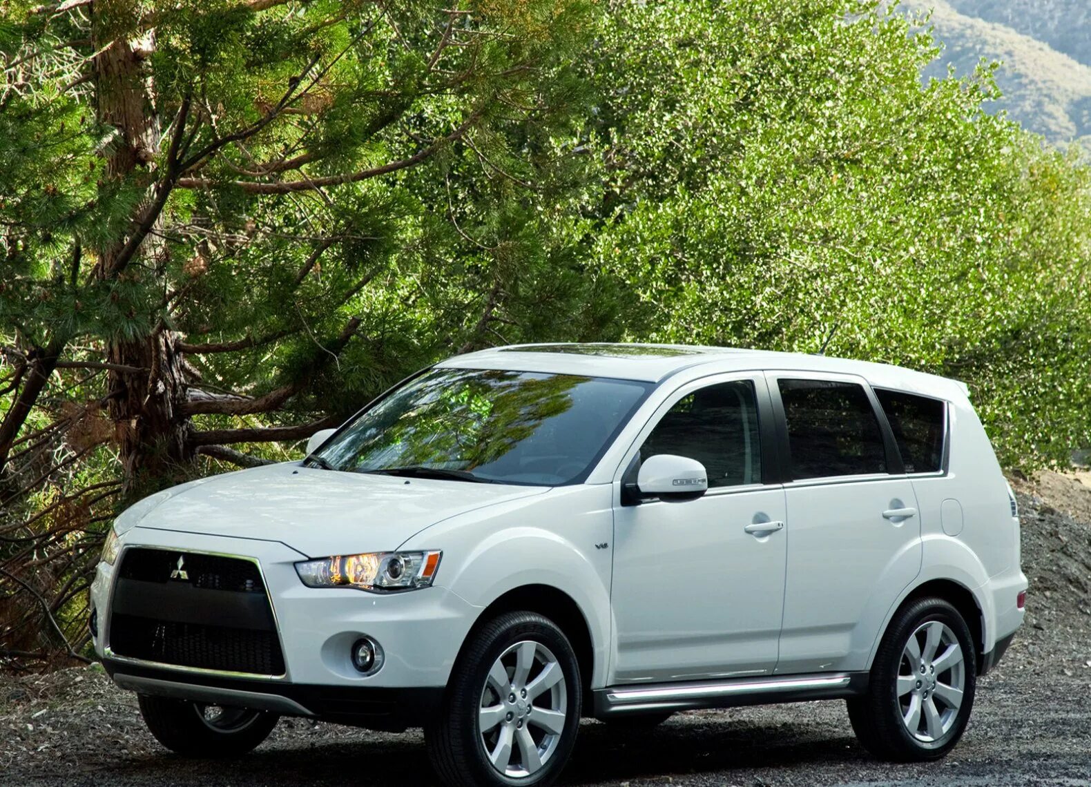 Мицубиси аутлендер хл 2010. Mitsubishi Outlander XL 2010. Митсубиши Аутлендер XL 2010. Мицубиси Аутлендер 2009. Mitsubishi Outlander XL 2013.