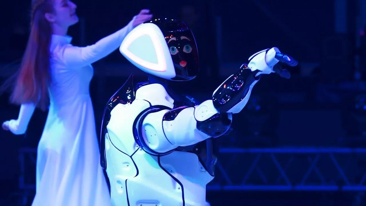 Танец роботов на играх будущего. Танец робота. Робот танцует. Шоу Танцующие роботы. Шоу танцы роботов.