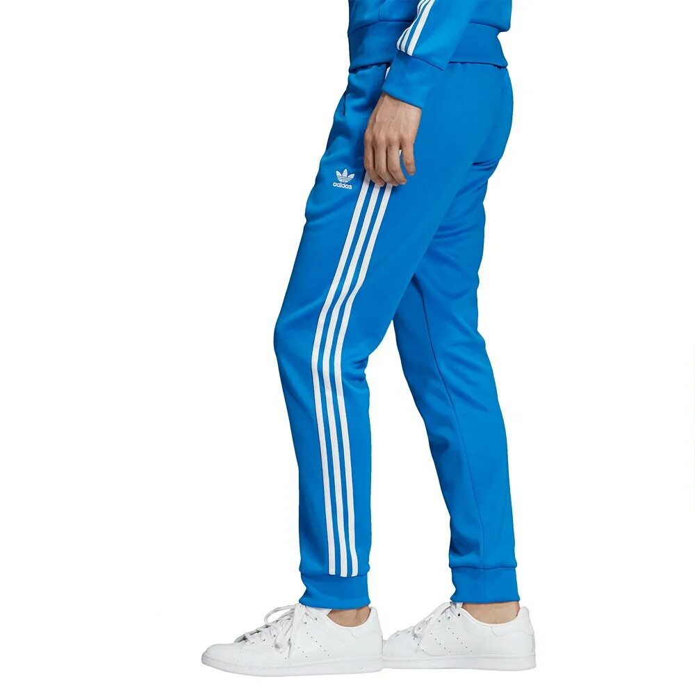 Штаны оригинал купить. Мужские брюки adidas Originals SST track. Adidas SST TP Blue брюки. Штаны adidas SST Blue Bird. Adidas Originals брюки спортивные SST TP P Blue.