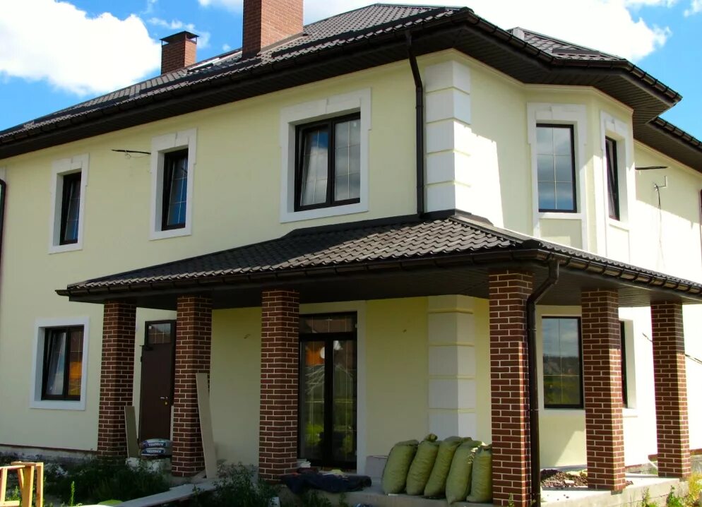 Дом отделанный термопанелями. Теплые фасады домов. Теплые фасады домов. Ханья фасадные. Клинкерные термопанели аляска.