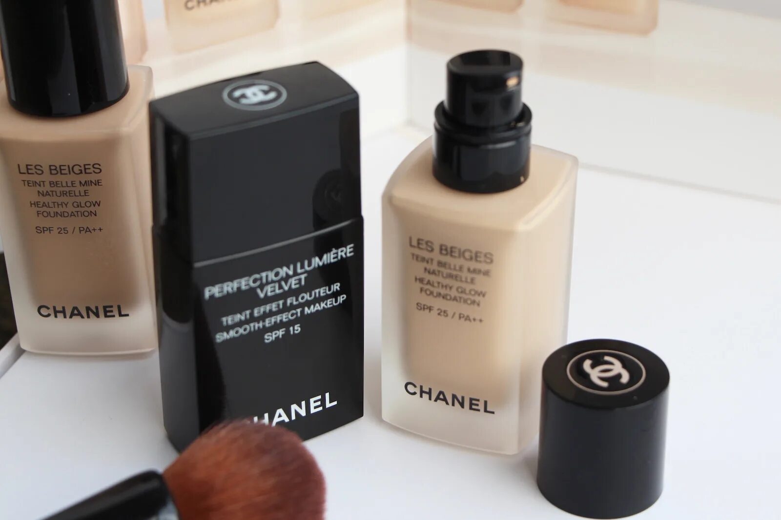 Chanel тональный крем. Vitalumiere chanel тональный флюид 40 оттенки. Шанель тональный флюид. Флюид от шанель 15 spf. Тональный крем chanel sublimine 75 ml.