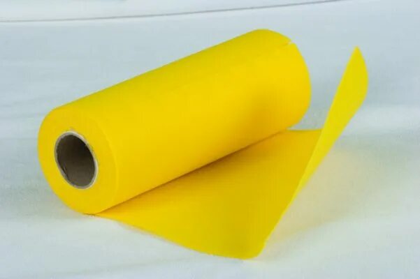 Рулон ткани. Желтые тканевые салфетки в рулоне. Желтый рулон мешочков. Желтый стрейч рулон реклама. Желтые очистки