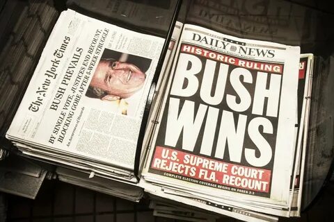 Newspaper headlines of George W. Bush’s victory for the presidency at Penn ...