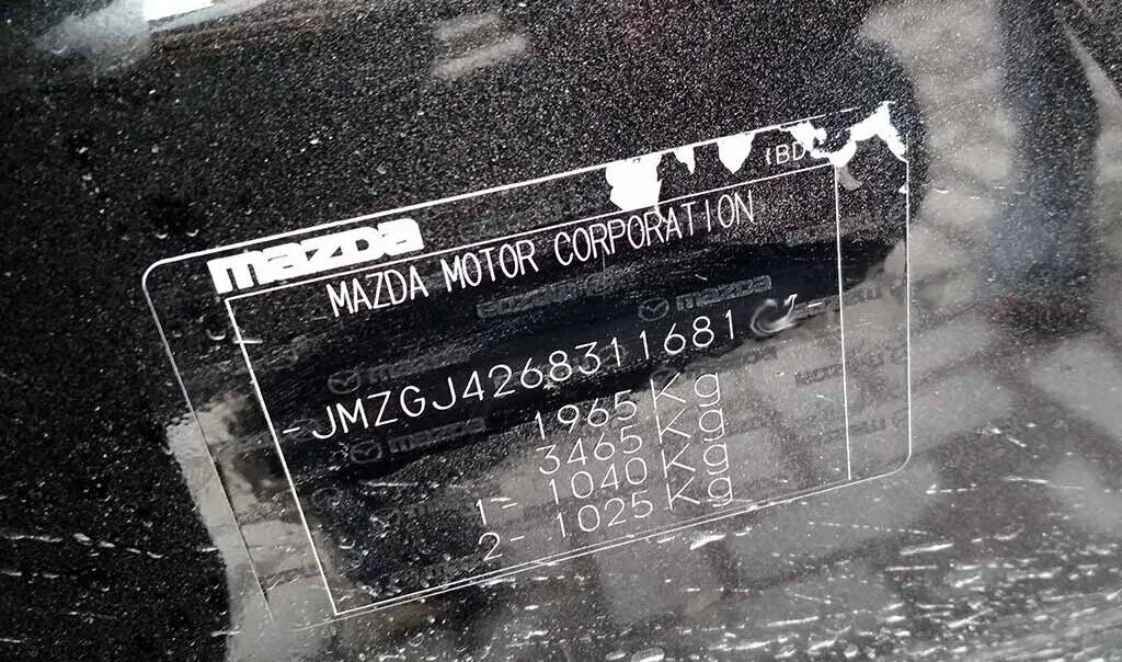 Код краски мазда 6. Mazda CX 5 VIN табличка. Табличка с вин Мазда СХ 5. Mazda CX-7 табличка VIN. Табличка номер кузова Mazda CX-5.