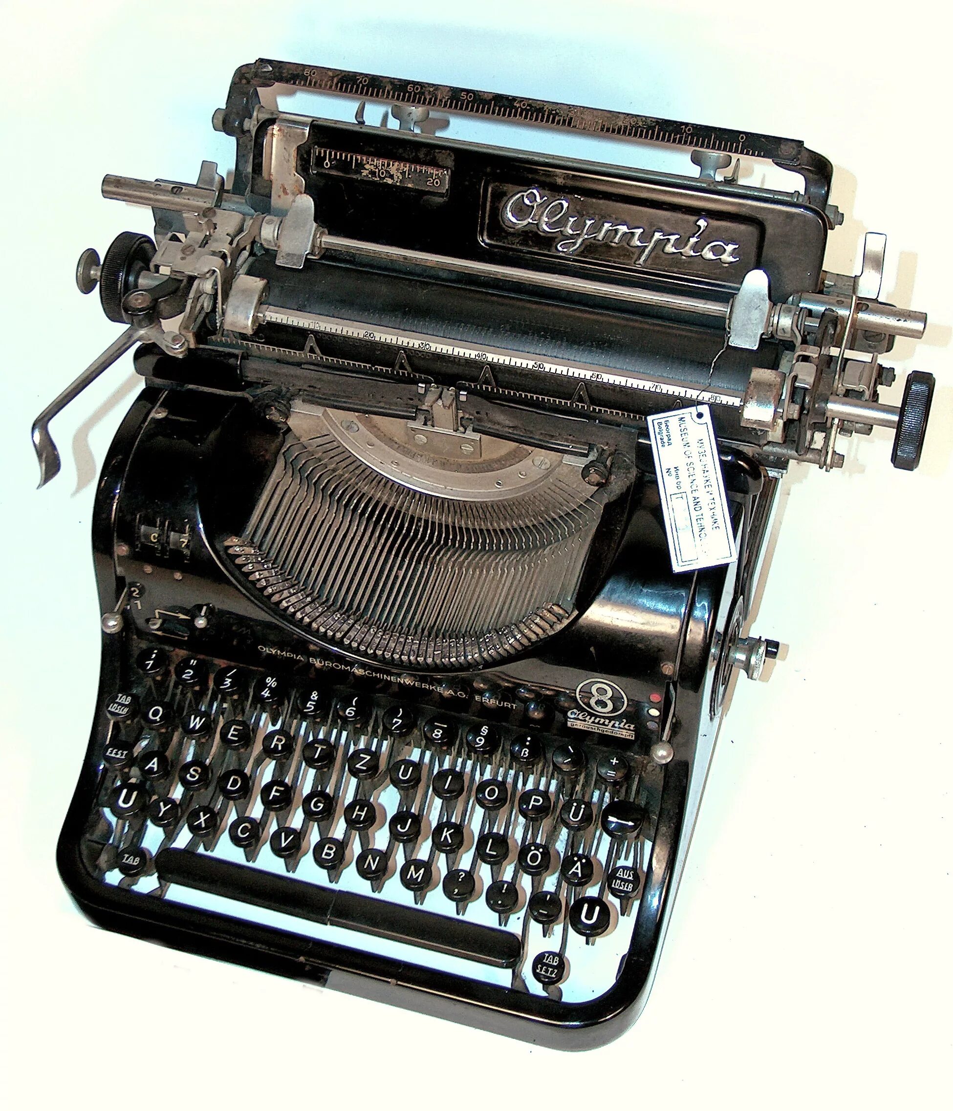 Первая модель 8. Печатная машинка Olympia 8. AEG Olympia Typewriter. Печатная машинка Olympia Mod 8 размер. Печатная машинка AEG Olympia.