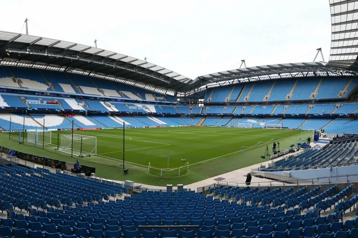 Etihad stadium. Этихад стадион манчестер сити. Стадион сити оф манчестер (этихад стэдиум). Etihad stadium. Стадион этихад манчестер.