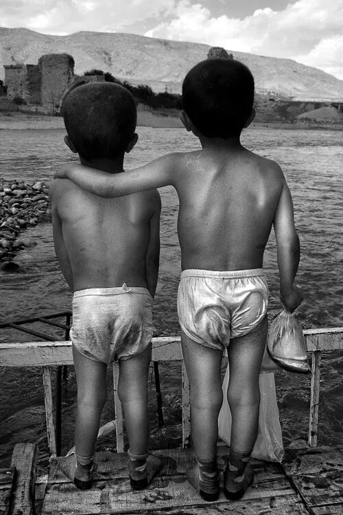 Two Boys in the Winter on a Background of the Statue. Stock Photo - Image of hou