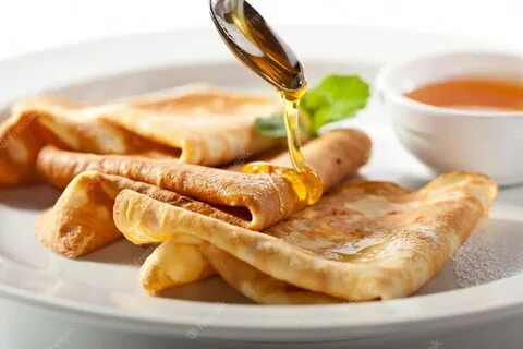 Блины с медом и листом мяты Премиум Фото