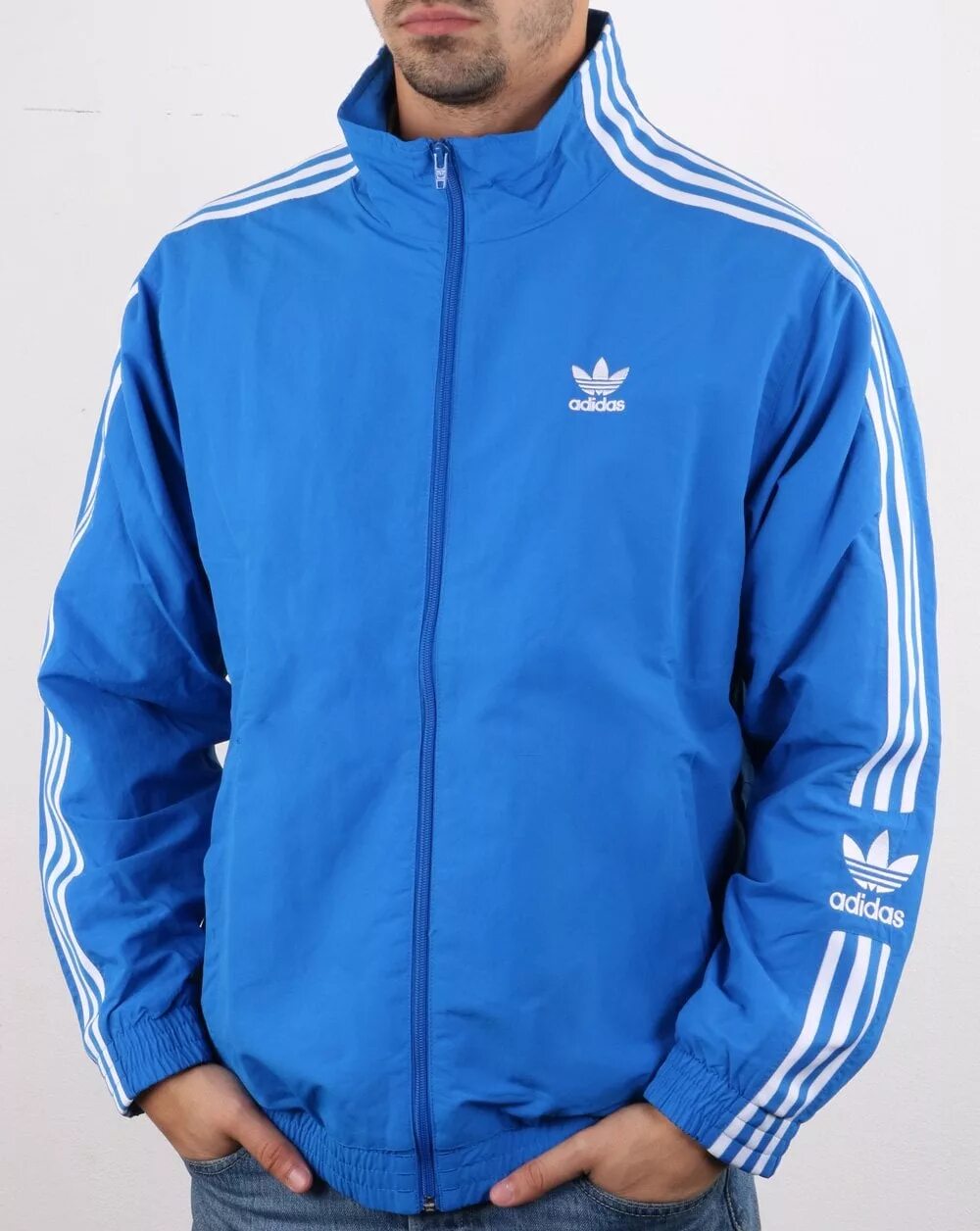 Костюмы адидас австрия. Track Jacket адидас. Костюм adidas Originals SST синий. Adidas Originals SST track Top бирюзовый. Adidas Jacket f180.