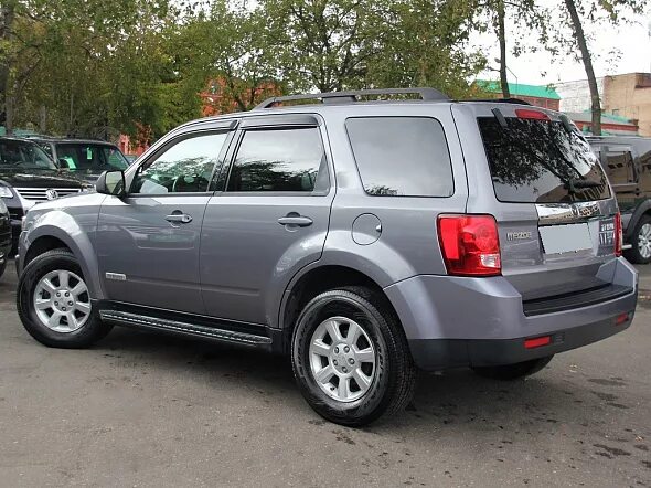 Mazda tribute 2008. Mazda tribute 2008. Мазда трибут 2008. Мазда трибьют 1 поколения фото с черными дисками. Mazda tribute 2007.