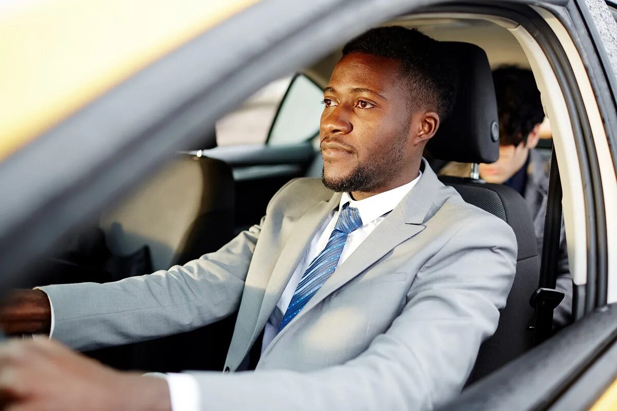 Nyla driver. Black driver. Car africa people. Мужчина за рулем автомобиля. Africa drive.