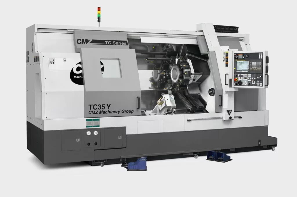 Станки чпу разработка. Станок tornos ЧПУ. Токарный станок с ЧПУ Fanuc "cke6150z/1000". Токарный станок с ЧПУ IRONMAC it-560. Трехкоординатный фрезерный станок.