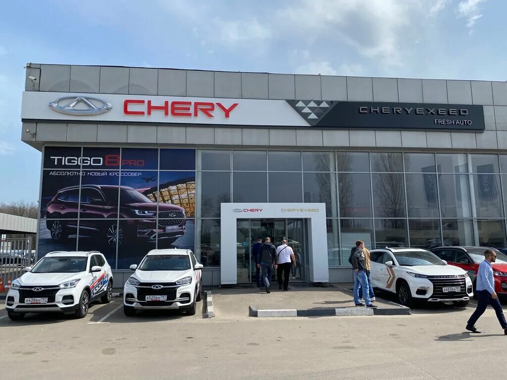Автосалон китайских автомобилей в москве. Exceed автосалон. Автосалон джили воронеж. Фасад дилерского центра gac. Дилеры китайских автомобилей воронеж.