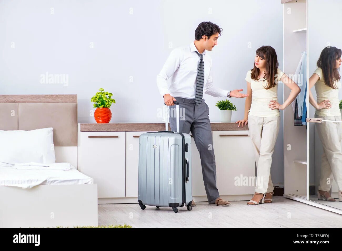Wife business trip. Жена провожает мужа. Behind her husband. Behind her husband. Клиенты обнимаются.