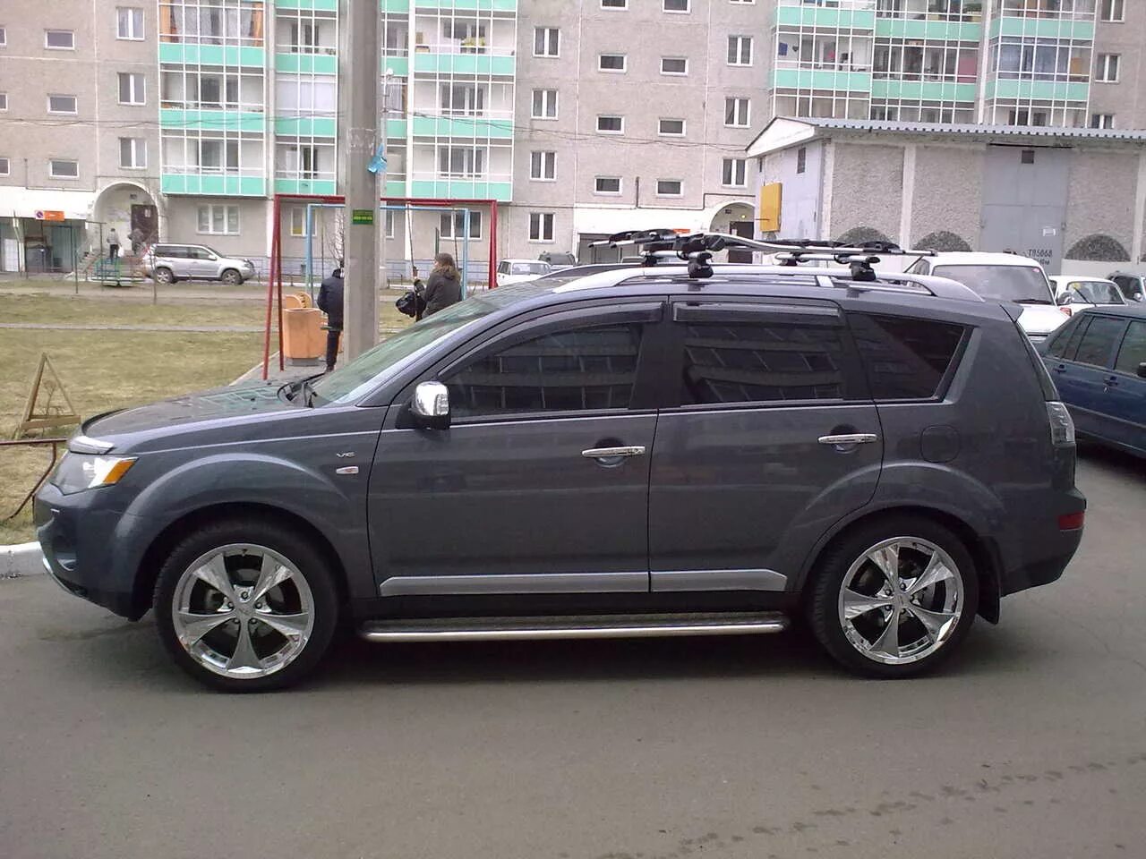 Мицубиси аутлендер хл 2008 года. Аутлендер ХЛ 2008. Аутлендер XL 2008. Mitsubishi Outlander XL 2008. Mitsubishi Outlander XL серый.