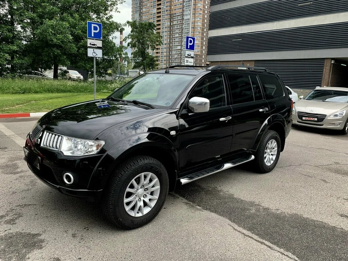 Pajero черный. Mitsubishi Pajero Sport черный 2011. Pajero Sport 2 черный. Mitsubishi Pajero Sport 2011 Black. Митсубиси Паджеро спорт 2011 дизель.