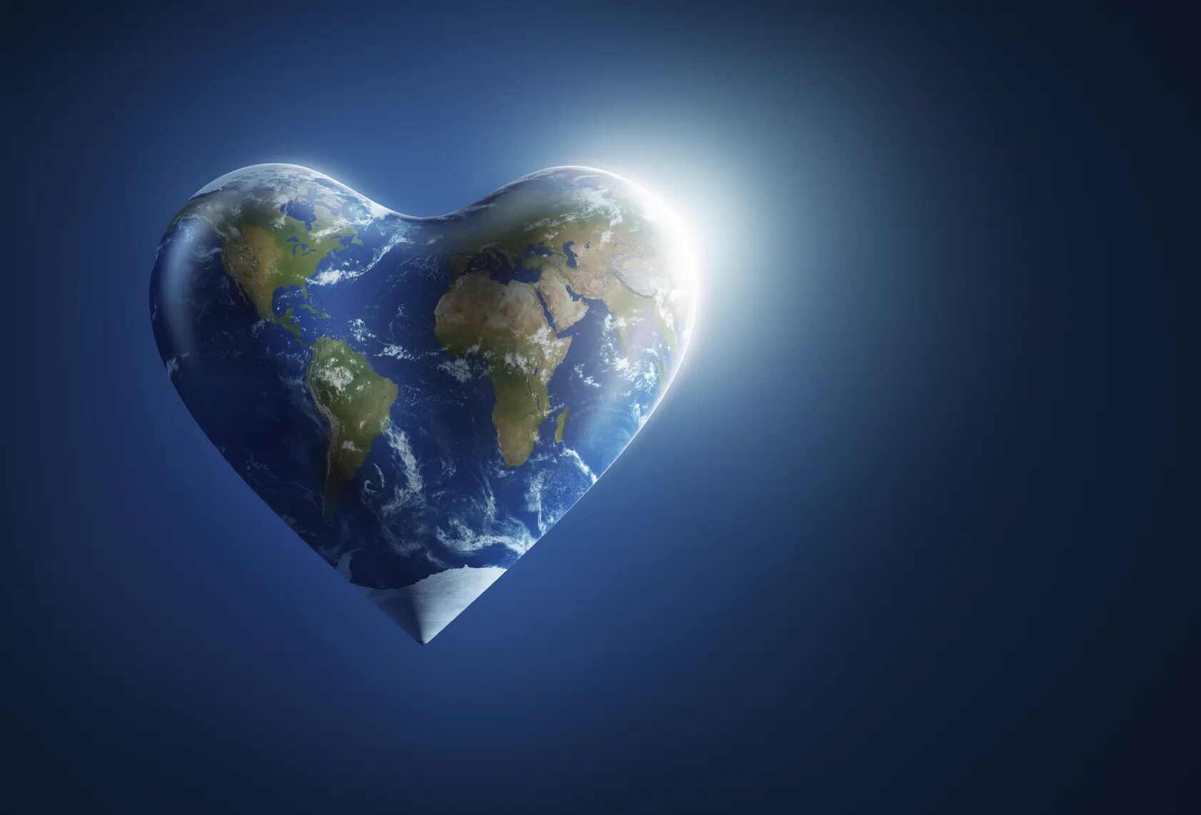 Мир люблю страна. Планета земля сердце. Земля в виде сердца. Земной шар в виде сердца. Планета в форме сердца.