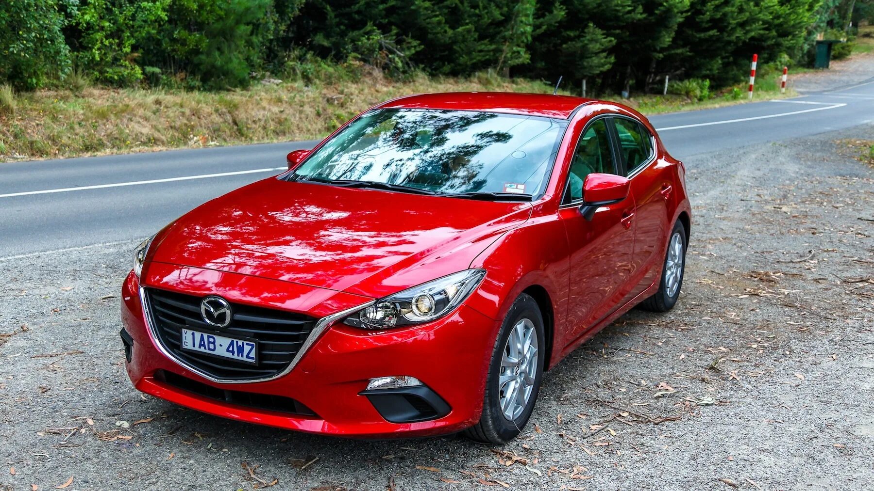 Мазда спб купить новую. Mazda 3 2014. Мазда 3 2014 цвет красный. Мазда 3 Review. Мазда 2014.