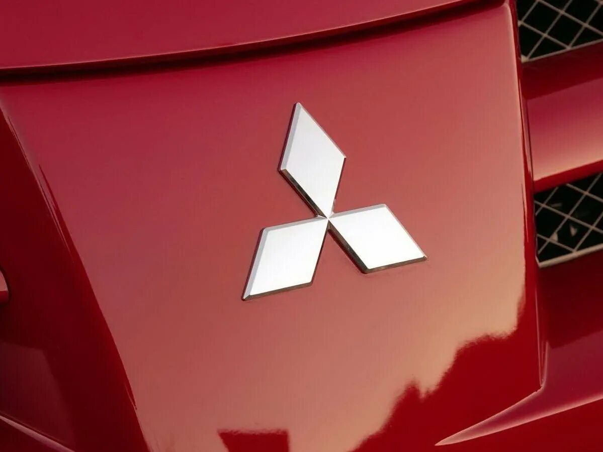 Что значит mitsubishi. Митсубиси лого. Митсубиси Лансер 10 лого. Знак Митсубиши. Марка машины Мицубиси значок.