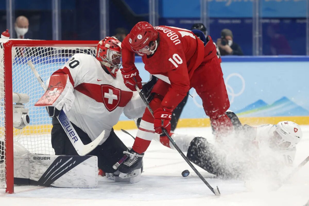 Сборная окр по хоккею. Сборная Швейцарии по хоккею. Швейцария на зимних играх. Россия Швейцария хоккей.