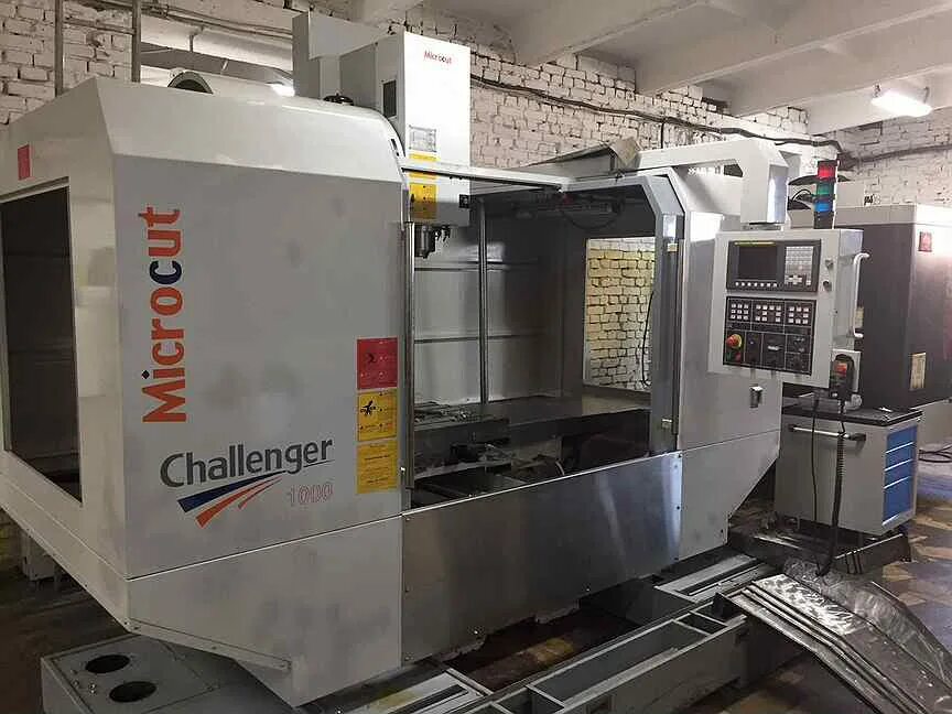 Обрабатывающий центр с чпу fanuc. Vm- 1000 станок чпу фрезерный microcut. vm- 1000 станок чпу фрезерный challenger. станок чпу vdl 1000 фрезерный с чпу fanuc. vm 1100 обрабатывающий центр.