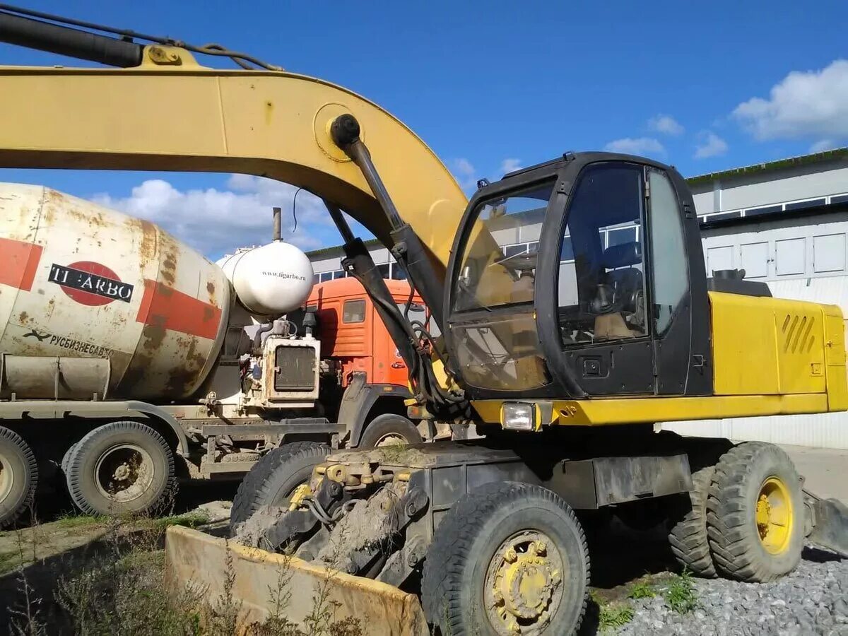 Экскаваторе 18. Колесный экскаватор "terex ek-18". Колесный экскаватор ек 18 60. Экскаватор твэкс 18. Экскаватор твэкс ек-18.