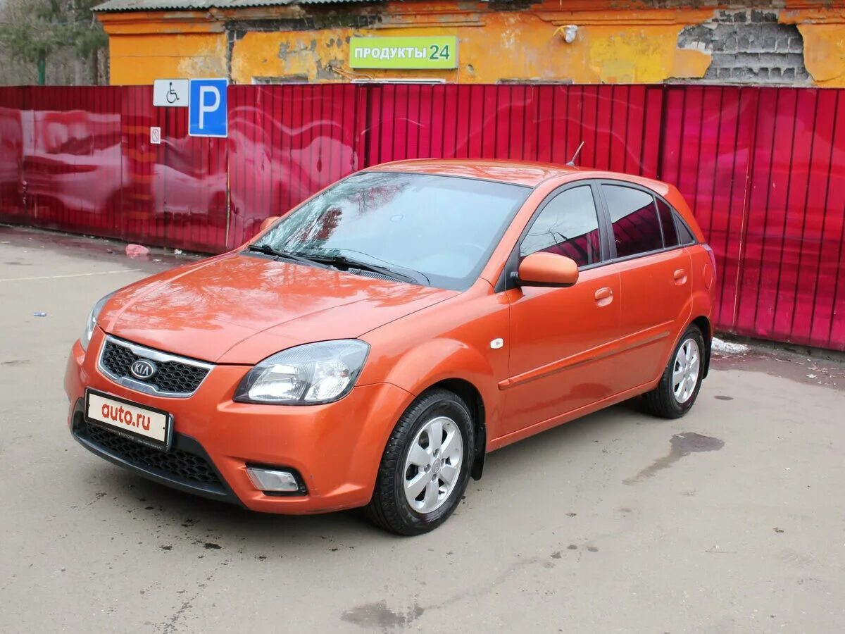 Рио хэтчбек 2011. Kia Rio 2 2011. Киа Рио 2 оранжевая. Kia Rio 2011 хэтчбек 1.4. Kia Rio 2 Hatchback.