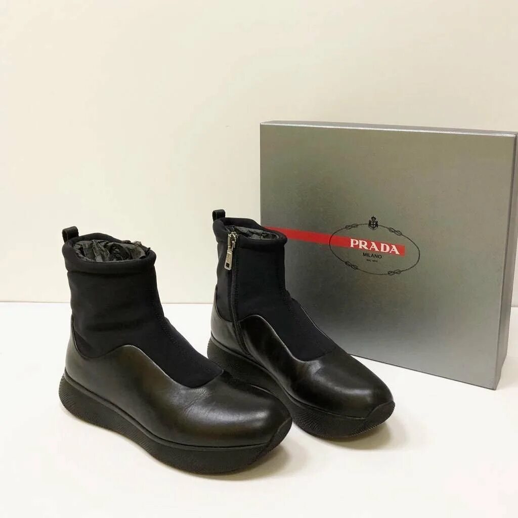 Цум ботинки женские. Ботинки высокие prada milano. ботинки прада цум. прада ботинки женские цум. зимние ботинки prada.