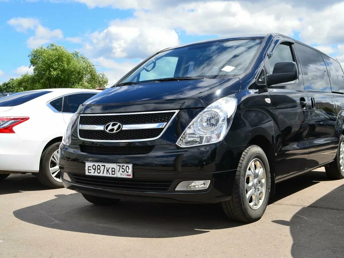 Гранд старекс купить бу авито. Hyundai Grand Starex h1 черный. H-1 Хундай 2012. Hyundai Starex h1 2012. Хендай h1 2012.