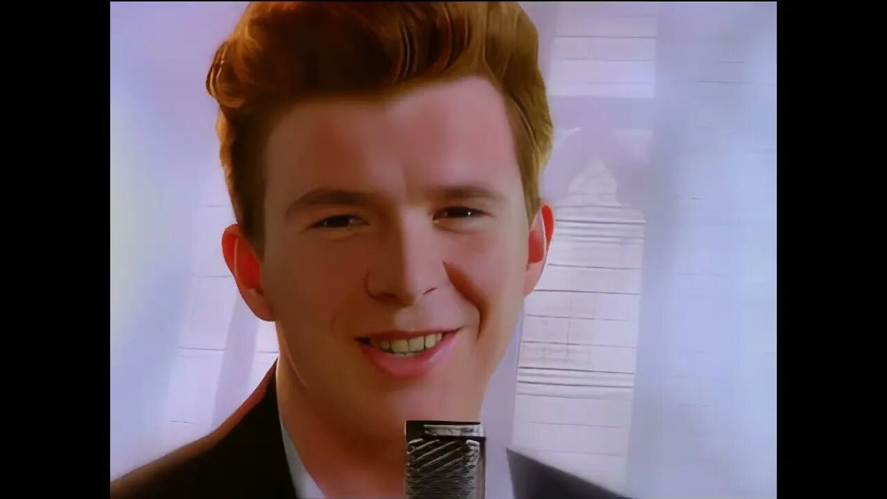 Музыка рикролл. Рик Эстли рикролл. Рик Эстли never gonna give you up. Rick Astley 1987. Рик Эстли 1987 рикролл.