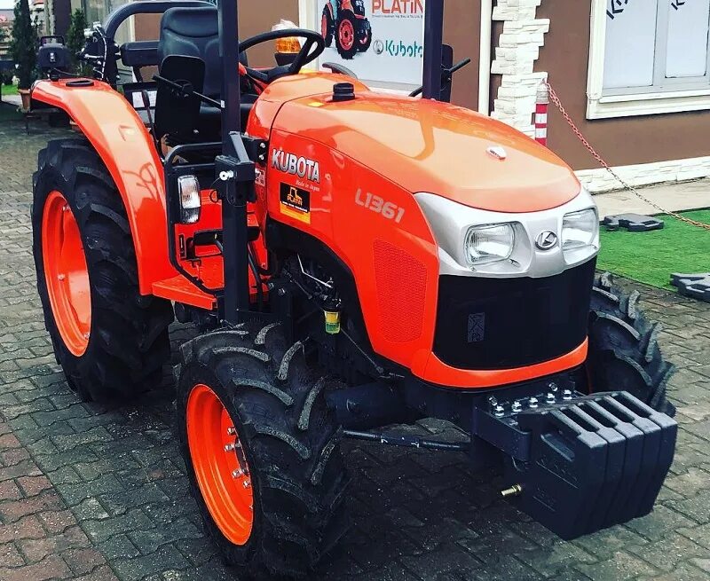 Мини тракторы новые цена. Kubota 7001 минитрактор. Минитрактор Кубота l2501. Минитрактор Кубота l2000e. Минитрактор Кубота в1620.