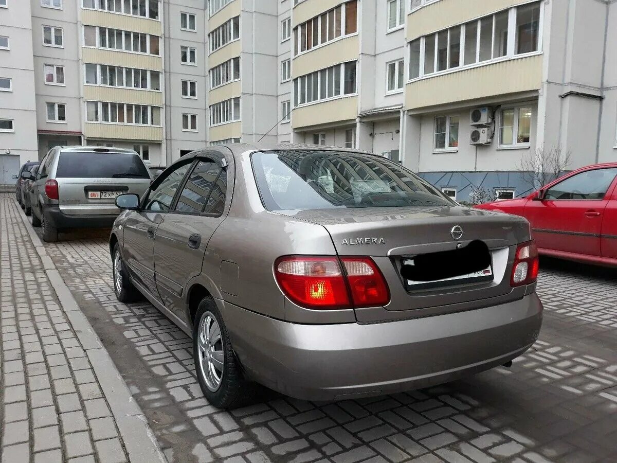 5. Nissan almera n16 хэтчбек. Nissan almera 2005 года. Nissan альмера 2005. Nissan almera ii (n16) 2001.