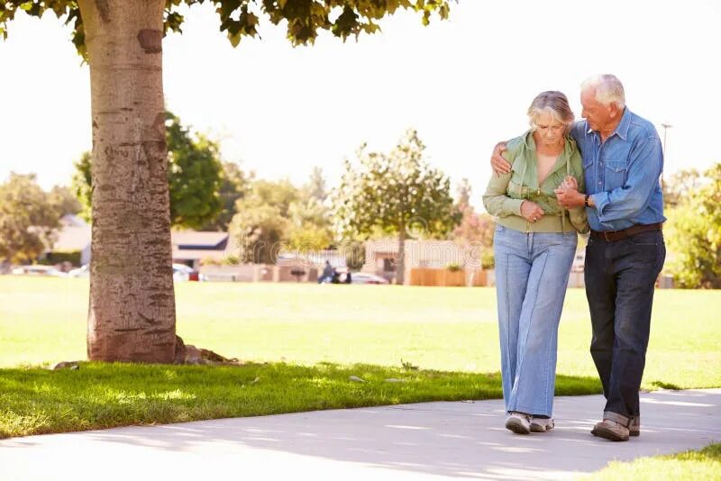 Helping the wife. Old people Train together Park.