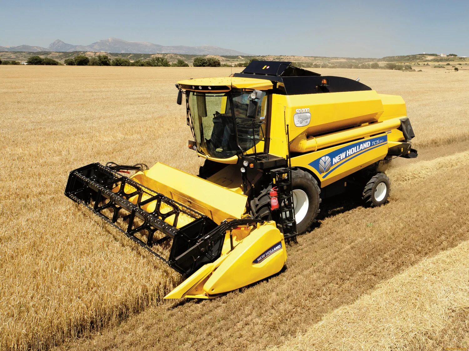 New holland цена. Комбайн Нью Холланд. Зерноуборочный комбайн ниухоланд. Комбайн Нью Холланд cr9000. Зерноуборочный комбайн New Holland.